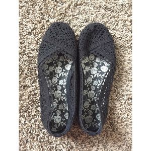 Black crocheted flats, size 7.